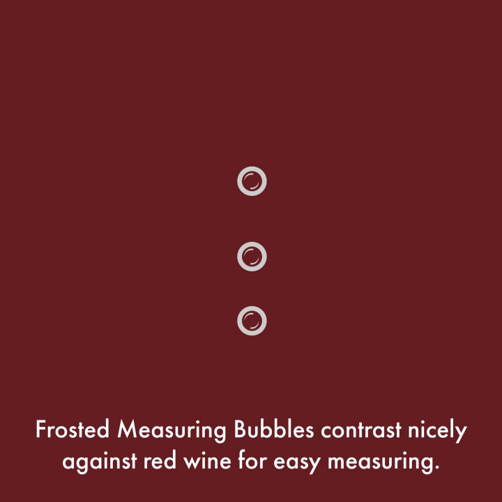 close-up of wine measuring marks of XL Elegance Measuring Wine Glass. The frosted wine measuring marks contrast nicely against red wine for easy measuring.